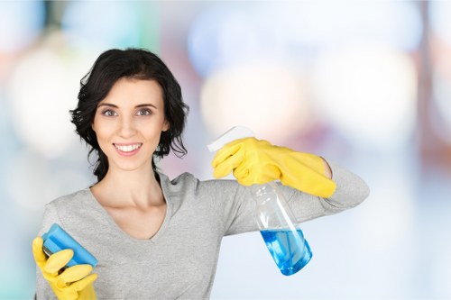 Technician cleaning hardwood floors with specialized equipment